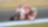 Pilote sur une superbike Ducati abordant un virage dans une course