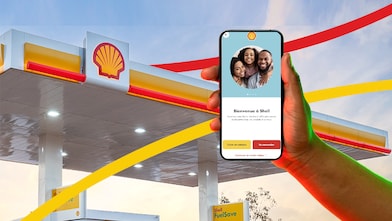 Une main montrant la page d’accueil de l’application Shell Africa